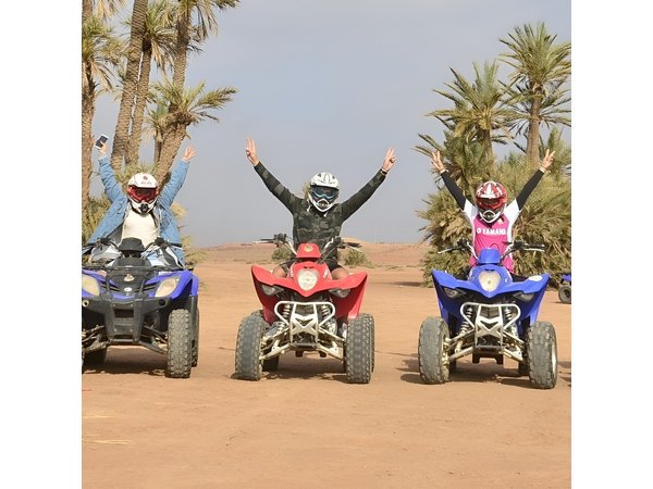 ATV ride in the desert palm grove Marrakech