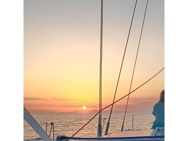 Private sunset cruise in Rhodes with fruits and drinks.