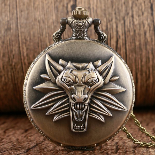 Montre de poche en bronze avec tête de lion rugissant en relief, cadran blanc et chiffres arabes