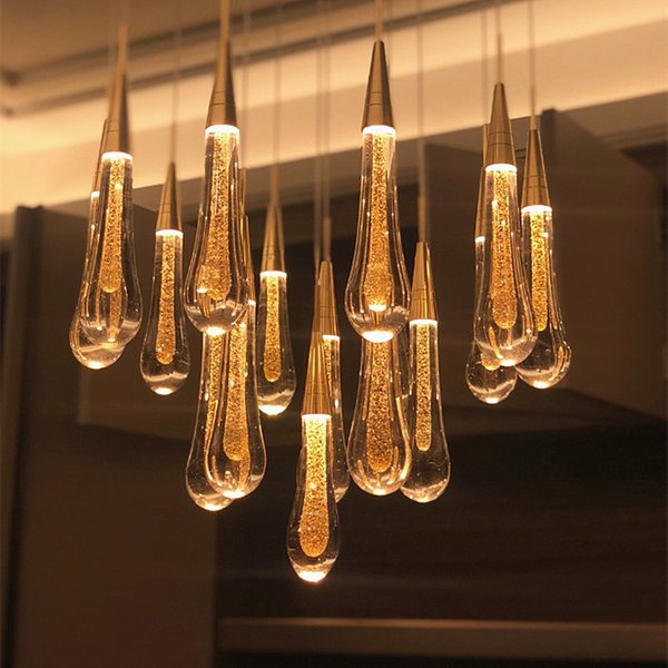 Lustre en cristal goutte d'eau doré, suspension créative, lustre rotatif de cage d'escalier nordique, salon, loft, luxe