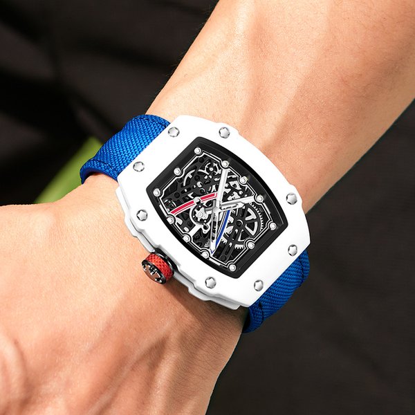 Montre à quartz ultra-fine en forme de tonneau pour homme, design élégant et lumineux, bracelet en nylon imperméable, montre-bracelet tendance.