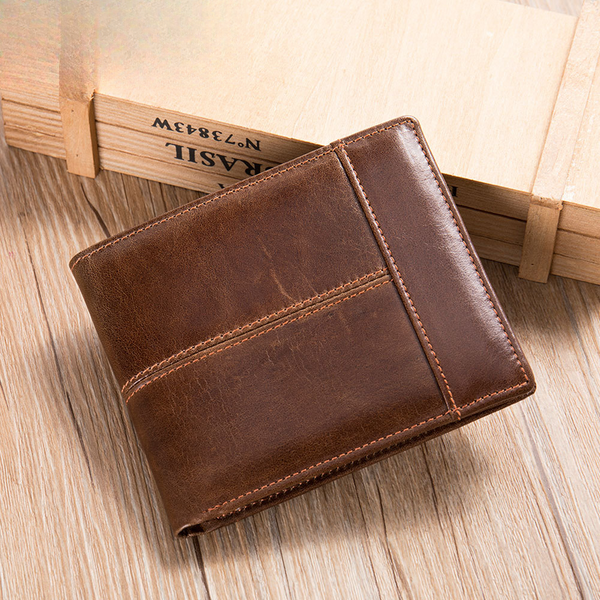 Male 2024 New Advanced Anti Theft Genuine Leather Men's Wallet Short Top Layer Cowhide Multi Card Men's Leather Wallet Zero Wallet-image