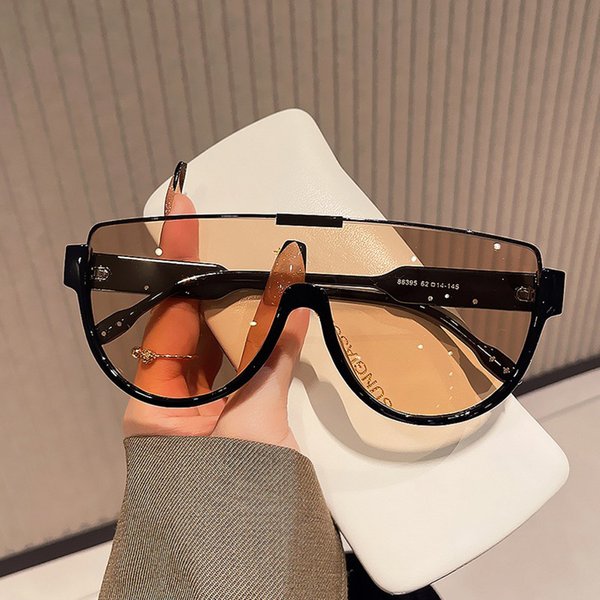 Fashionable brown one piece half circle sunglasses for women Korean version of ins mask lower half frame slim sunglasses trend