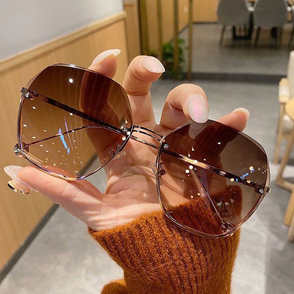2024 New frameless cut edge trendy slim face, fashionable and stylish sunglasses for women with UV protection