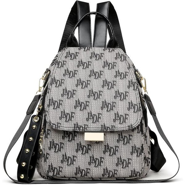 Mochila De Letra Grande De Alta Gama Para Mujer Remaches Gran Capacidad Antirrobo Mochila De Viaje Bolso Mochila Escolar Para Estudiante Femenina De Moda-image