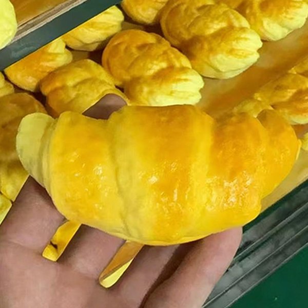 Powoli RosnąCy Rogalik Squishy Do śCiskania Fidget Toy MięKka Zabawka Sensoryczna łAgodząCa LęK I Stres Zabawka Dekompresyjna 1Pcs-image
