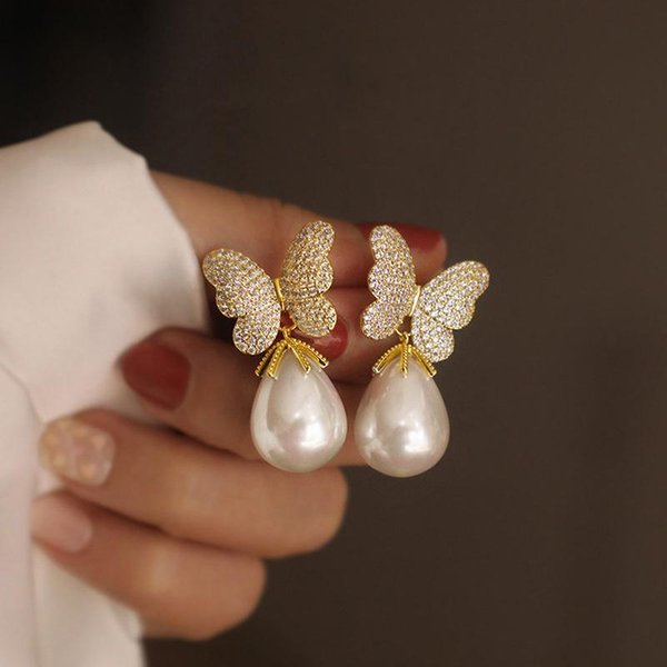 Pendientes EstéTicos De Mariposa Huitan Con Perla De ImitacióN De Pera Pendientes Exquisitos Para Mujeres Fiesta De Bodas JoyeríA De Lujo De Moda-image