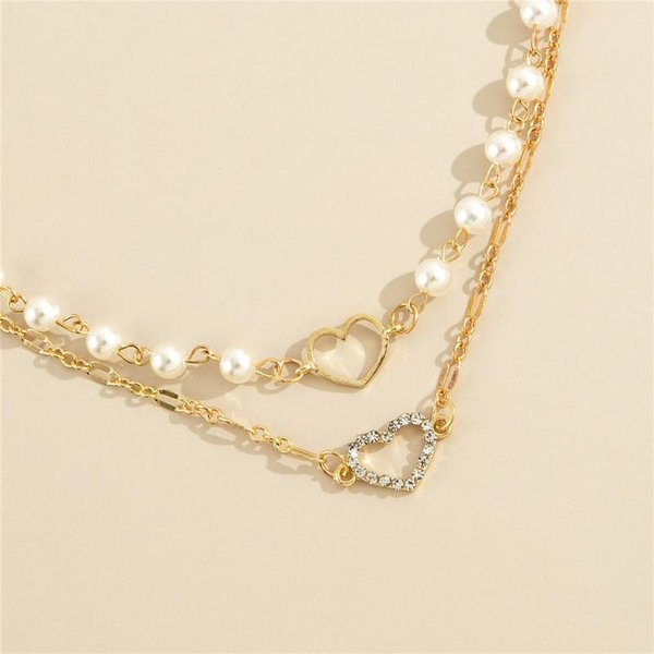 Moda Perlas De Doble Capa Apiladas Con Cadena Para ClavíCula Retro, Cadena Para Cuello, Collar Con Colgante De Amor Hueco Lleno De Diamantes Oro-image