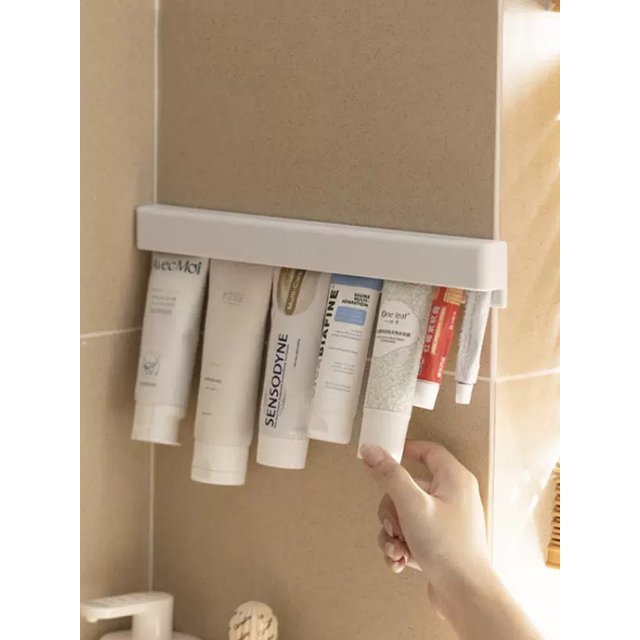 Multi functional wall mounted storage clip - suitable for storing toothpaste racks such as toothpaste, facial cleansers, ointmen