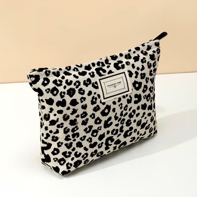 Stylish Off-White Leopard Print Makeup Bag - Spacious and Organized Storage for Cosmetics