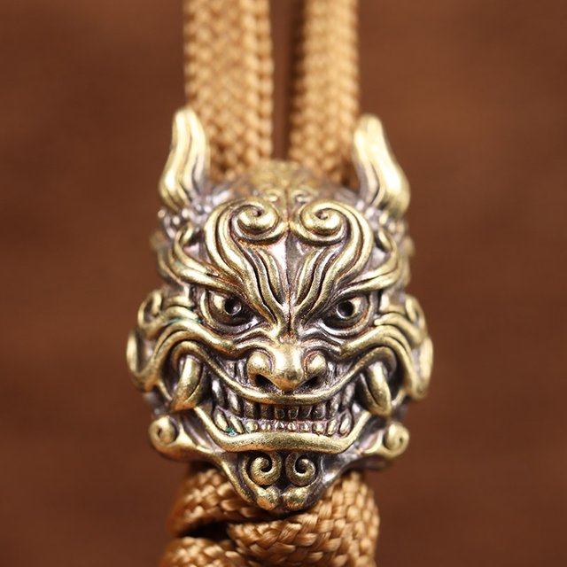 Mahakala tête Sculpture couteau en laiton perles EDC extérieur bricolage paracorde accessoires tissé
