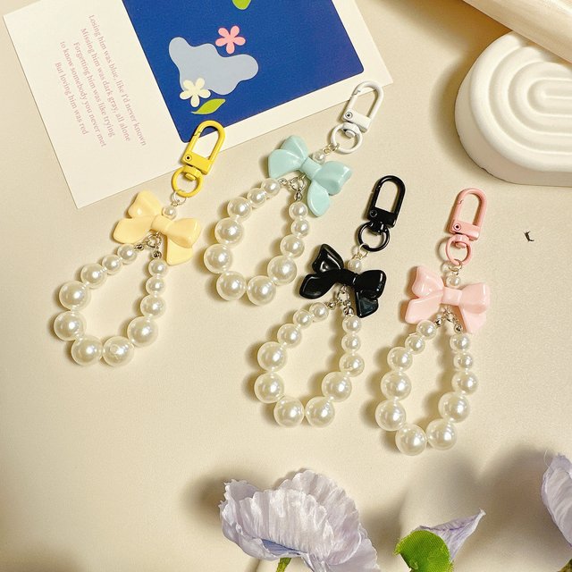 Petit porte-clés en forme de nœud avec perle parfumée, décoration à tenir à la main, accessoire pour sac à dos