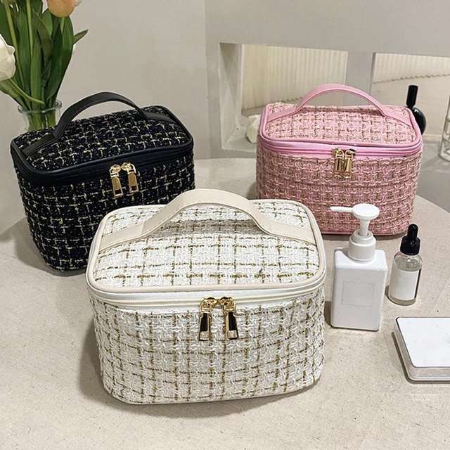 Nieuwe vrouwentas gebreide stijl make-up tas draagbare draagbare draagbare make-up tas modieuze grote opslagtas
