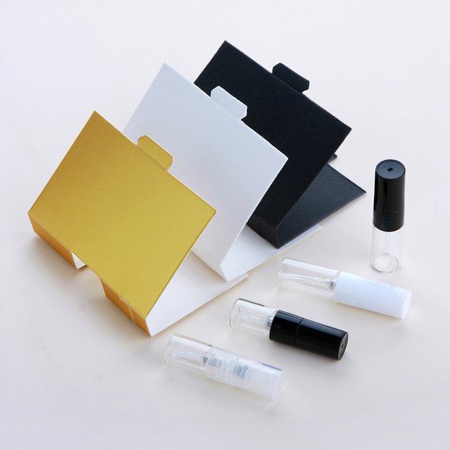 100 pièces/lot 1ml 2ml Mini bouteille de parfum atomiseur Collocation boîte d'emballage blanc ou noir vaporisateur bouteille cadeau