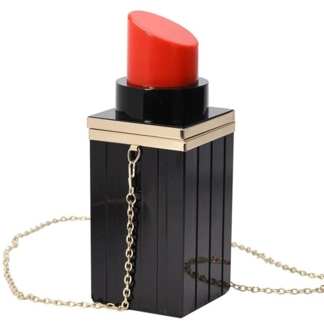 Damentasche in Lippenstiftform 8 x 8 x 21 cm Schwarzer Körper mit roter Spitze Goldener Metallrahmen Lange Kette über der Schulter