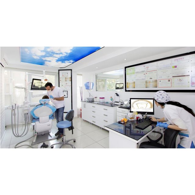 Dental Check-Up + Hygienist Treatment, X-Ray & Home Teeth Whitening