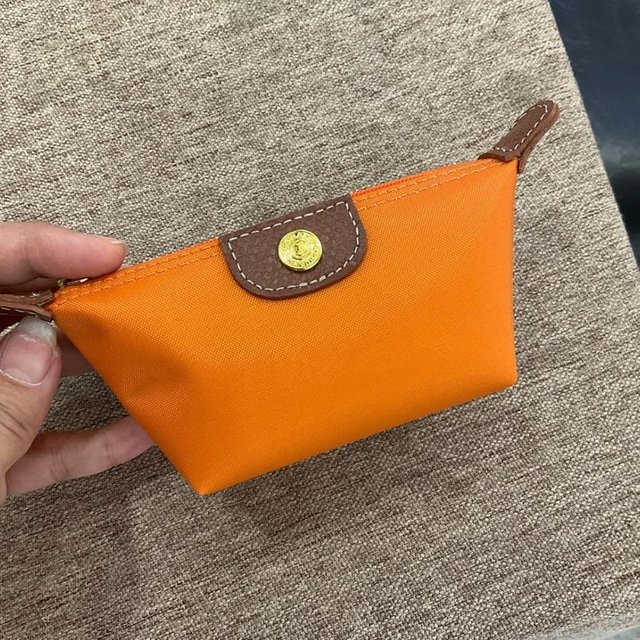 Mini exquisite Geldbörse, leichte und modische Knödeltasche, tragbares Nylongewebe, Lippenstift, Kopfhörer, Aufbewahrungstasche, weiblicher Ins-Stil orange