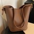 Korean niche handbag women’s 2024 new super hot summer crossbody bucket fashionable commuting single shoulder armpit bag