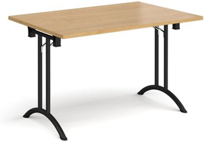 Office Monster | Dams Rectangular folding leg table with black legs and curved foot rails 1200mm x 800mm - oak Dams Rectangular folding leg table with black legs and curved foot rails 1200mm x 800mm - oak
