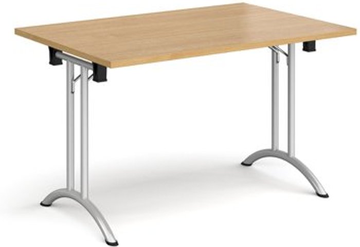Office Monster | Dams Rectangular folding leg table with silver legs and curved foot rails 1200mm x 800mm - oak Dams Rectangular folding leg table with silver legs and curved foot rails 1200mm x 800mm - oak