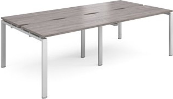 Office Monster | Adapt Adapt double back to back desks 2400mm x 1200mm - silver frame, grey oak top Adapt Adapt double back to back desks 2400mm x 1200mm - silver frame, grey oak top