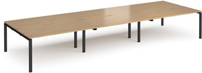 Office Monster | Adapt Bench Desk | 6 Person Rectangular Desks 4800mm | Oak Tops With Black Frames | 1600mm Depth | Adapt Adapt Bench Desk | 6 Person Rectangular Desks 4800mm | Oak Tops With Black Frames | 1600mm Depth | Adapt
