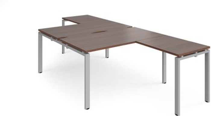 Office Monster | Adapt Bench Desk | 2 Person With Return Desks 1400mm | Walnut Tops With Silver Frames | Adapt Adapt Bench Desk | 2 Person With Return Desks 1400mm | Walnut Tops With Silver Frames | Adapt