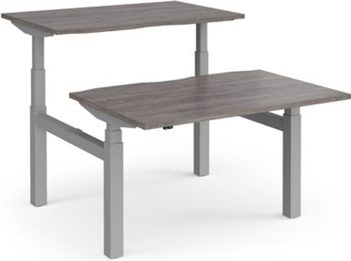 Office Monster | Elev8 Elev8 Touch sit-stand back-to-back desks 1200mm x 1650mm - silver frame, grey oak top Elev8 Elev8 Touch sit-stand back-to-back desks 1200mm x 1650mm - silver frame, grey oak top