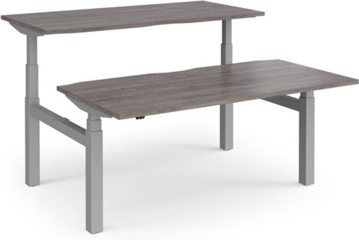 Office Monster | Elev8 Elev8 Touch sit-stand back-to-back desks 1600mm x 1650mm - silver frame, grey oak top Elev8 Elev8 Touch sit-stand back-to-back desks 1600mm x 1650mm - silver frame, grey oak top