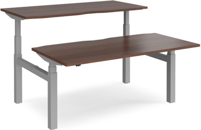 Office Monster | Elev8 Height Adjustable Desk | Back To Back Rectangular Desks 1600mm | Walnut Tops With Silver Frames | Elev8 Touch Elev8 Height Adjustable Desk | Back To Back Rectangular Desks 1600mm | Walnut Tops With Silver Frames | Elev8 Touch