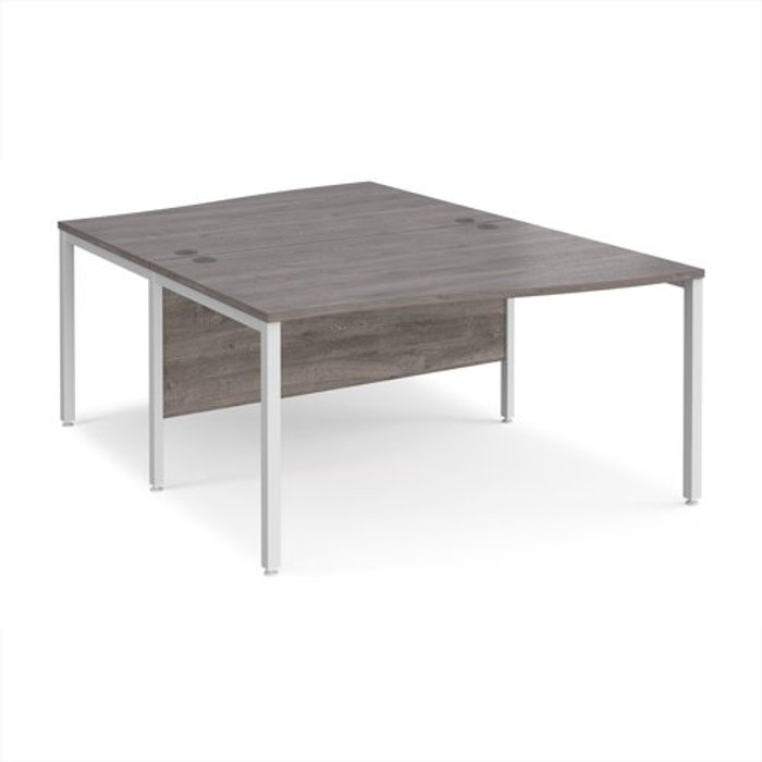 Office Monster | Maestro 25 Maestro 25 back to back wave desks 1400mm deep - white bench leg frame, grey oak top Maestro 25 Maestro 25 back to back wave desks 1400mm deep - white bench leg frame, grey oak top