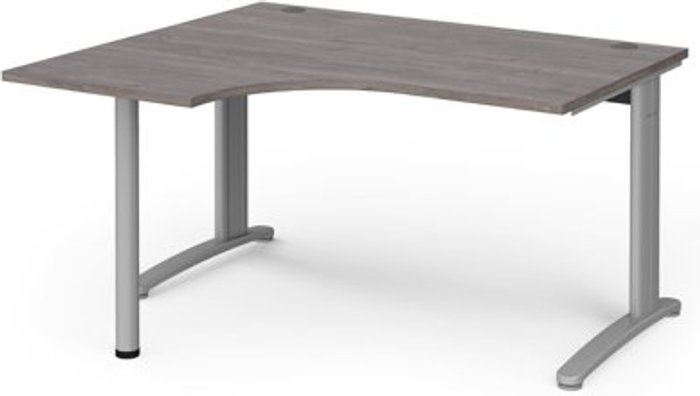 Office Monster | TR10 TR10 left hand ergonomic desk 1400mm - silver frame, grey oak top TR10 TR10 left hand ergonomic desk 1400mm - silver frame, grey oak top