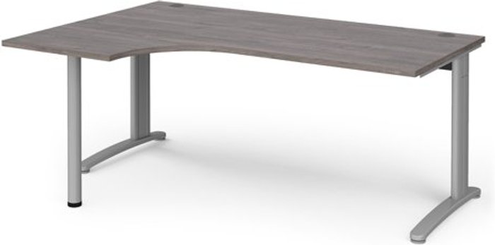 Office Monster | TR10 TR10 left hand ergonomic desk 1800mm - silver frame, grey oak top TR10 TR10 left hand ergonomic desk 1800mm - silver frame, grey oak top