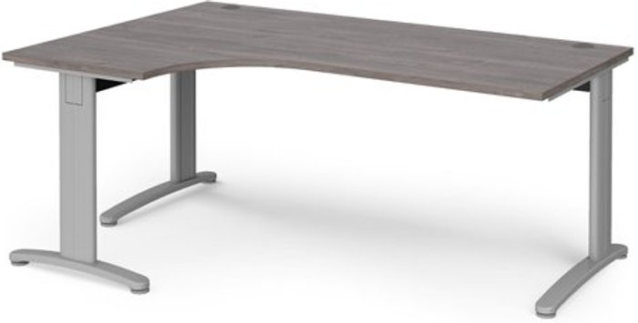 Office Monster | TR10 TR10 deluxe left hand ergonomic desk 1800mm - silver frame, grey oak top TR10 TR10 deluxe left hand ergonomic desk 1800mm - silver frame, grey oak top