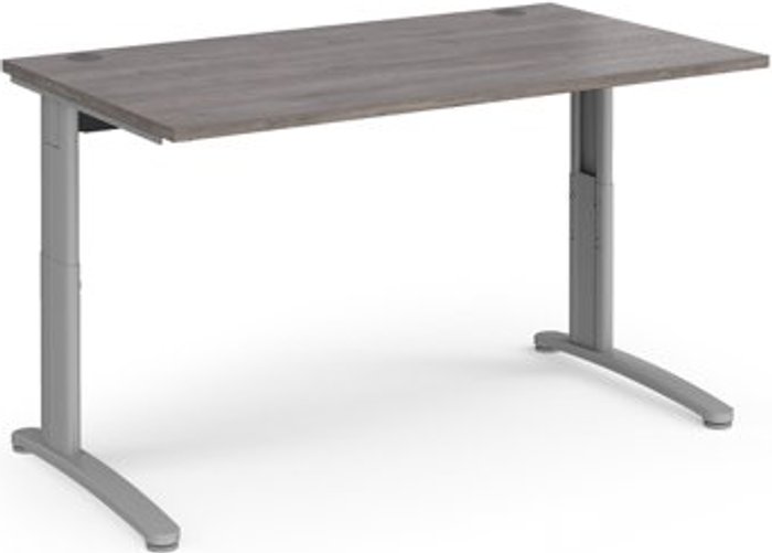 Office Monster | TR10 TR10 height settable straight desk 1400mm x 800mm - silver frame, grey oak top TR10 TR10 height settable straight desk 1400mm x 800mm - silver frame, grey oak top
