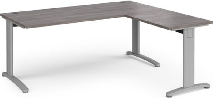 Office Monster | TR10 TR10 desk 1800mm x 800mm with 800mm return desk - silver frame, grey oak top TR10 TR10 desk 1800mm x 800mm with 800mm return desk - silver frame, grey oak top