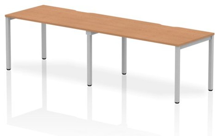 Office Monster | Evolve Single Silver Frame Bench Desk 1400 Oak (2 Pod) Evolve Single Silver Frame Bench Desk 1400 Oak (2 Pod)