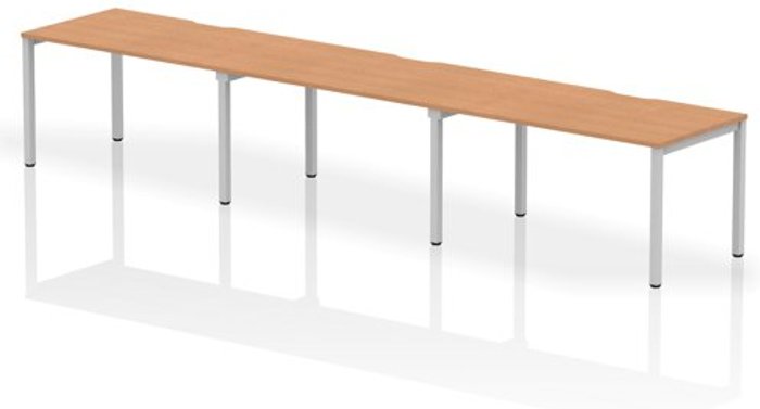 Office Monster | Evolve Single Silver Frame Bench Desk 1400 Oak (3 Pod) Evolve Single Silver Frame Bench Desk 1400 Oak (3 Pod)