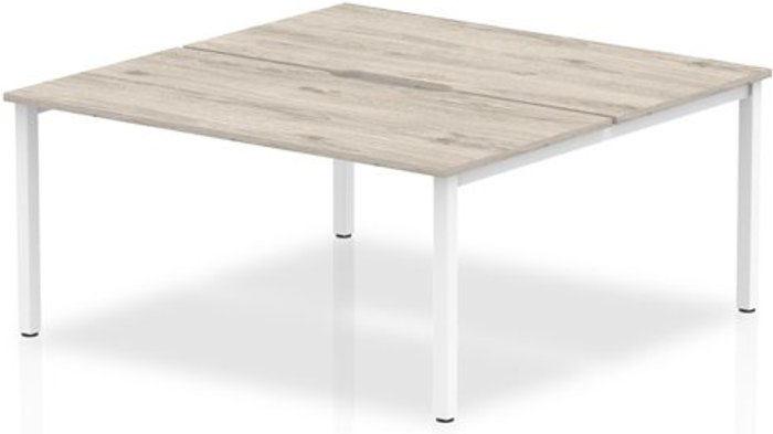 Office Monster | Evolve B2B White Frame Bench Desk 1600 Grey Oak (2 Pod) Evolve B2B White Frame Bench Desk 1600 Grey Oak (2 Pod)