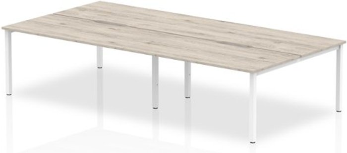 Office Monster | Evolve B2B White Frame Bench Desk 1600 Grey Oak (4 Pod) Evolve B2B White Frame Bench Desk 1600 Grey Oak (4 Pod)