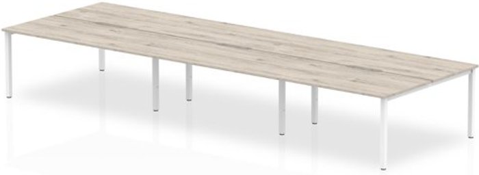 Office Monster | Evolve B2B White Frame Bench Desk 1600 Grey Oak (6 Pod) Evolve B2B White Frame Bench Desk 1600 Grey Oak (6 Pod)
