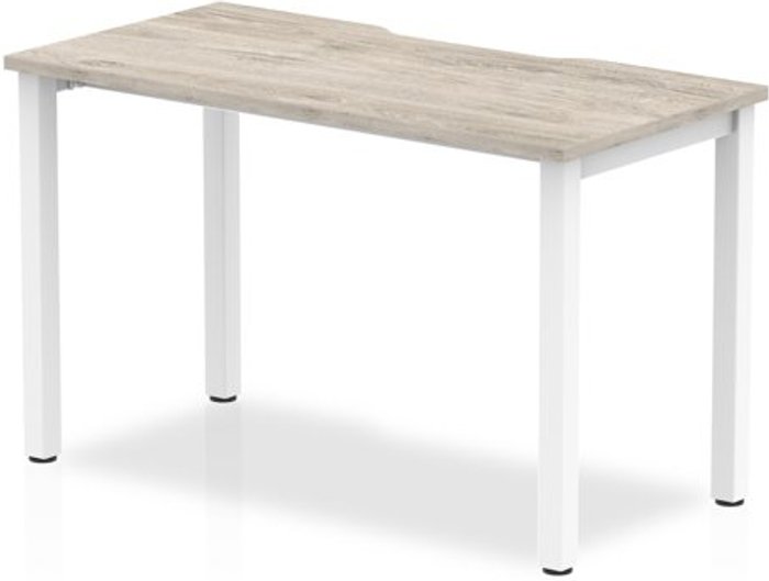 Office Monster | Evolve Single White Frame Bench Desk 1200 Grey Oak Evolve Single White Frame Bench Desk 1200 Grey Oak