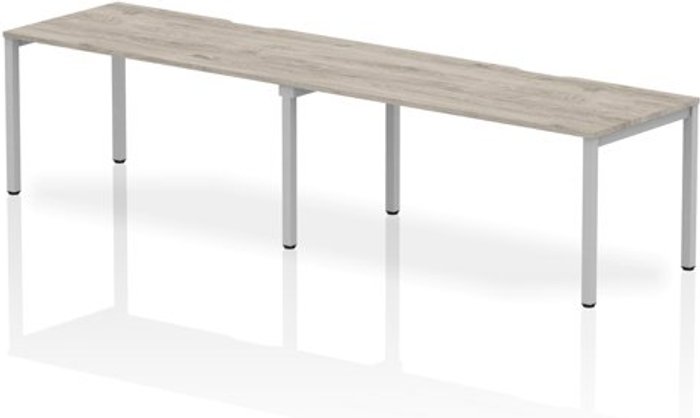 Office Monster | Evolve Single Silver Frame Bench Desk 1600 Grey Oak (2 Pod) Evolve Single Silver Frame Bench Desk 1600 Grey Oak (2 Pod)