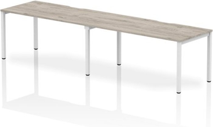 Office Monster | Evolve Single White Frame Bench Desk 1600 Grey Oak (2 Pod) Evolve Single White Frame Bench Desk 1600 Grey Oak (2 Pod)
