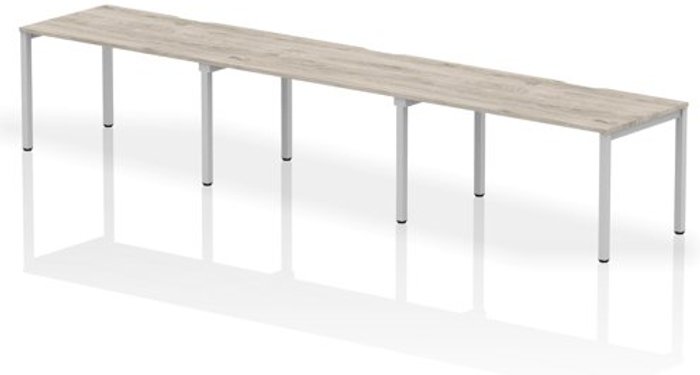 Office Monster | Evolve Single Silver Frame Bench Desk 1400 Grey Oak (3 Pod) Evolve Single Silver Frame Bench Desk 1400 Grey Oak (3 Pod)