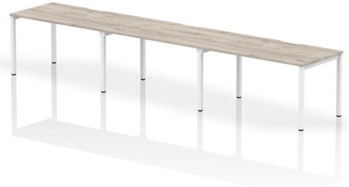 Office Monster | Evolve Single White Frame Bench Desk 1400 Grey Oak (3 Pod) Evolve Single White Frame Bench Desk 1400 Grey Oak (3 Pod)