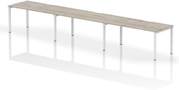 Office Monster | Evolve Single White Frame Bench Desk 1600 Grey Oak (3 Pod) Evolve Single White Frame Bench Desk 1600 Grey Oak (3 Pod)