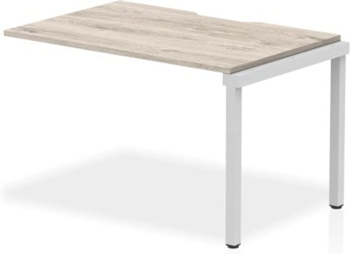 Office Monster | Evolve Single Ext Kit Silver Frame Bench Desk 1200 Grey Oak Evolve Single Ext Kit Silver Frame Bench Desk 1200 Grey Oak