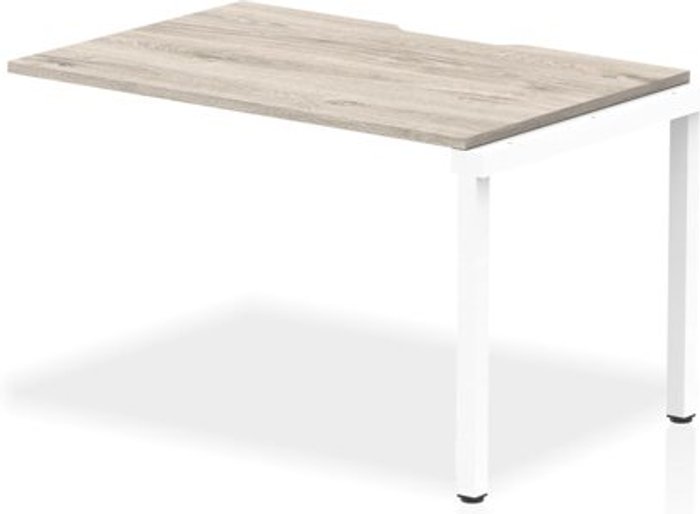 Office Monster | Evolve Single Ext Kit White Frame Bench Desk 1200 Grey Oak Evolve Single Ext Kit White Frame Bench Desk 1200 Grey Oak