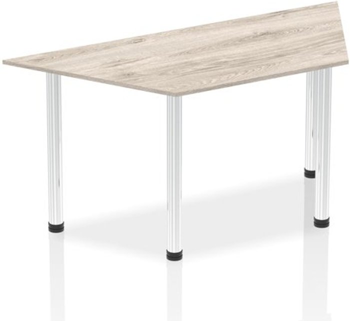 Office Monster | Impulse Impulse 1600mm Trapezium Grey Oak Top Chrome Post Leg Impulse Impulse 1600mm Trapezium Grey Oak Top Chrome Post Leg